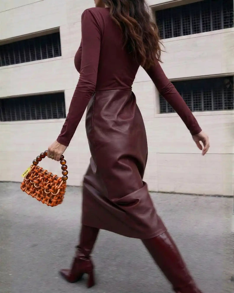 modella indossa borsa a mano in resina arancione metallizzato