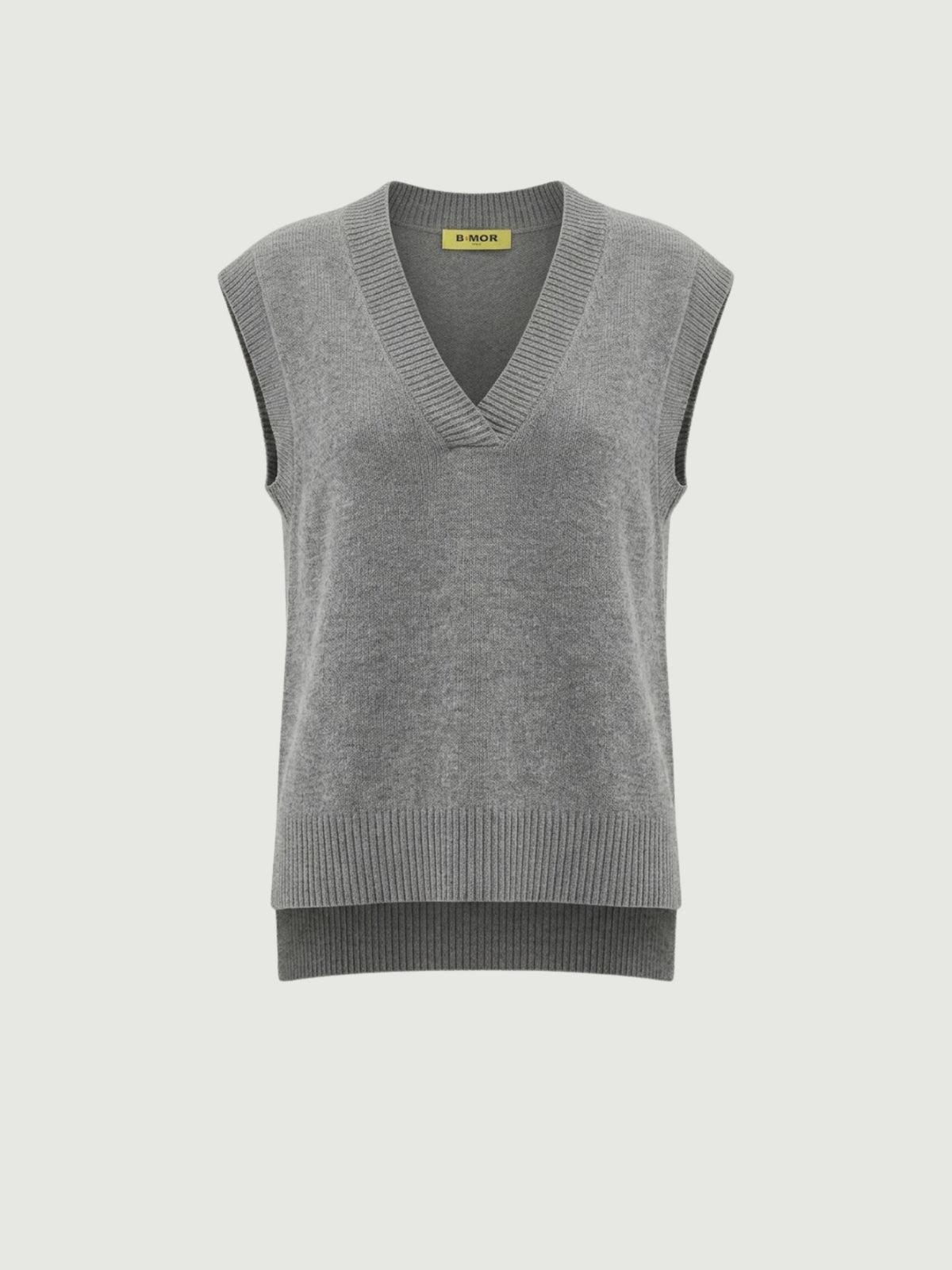 Vista frontale gilet over color carbone con scollo a V taglio asimmetrico